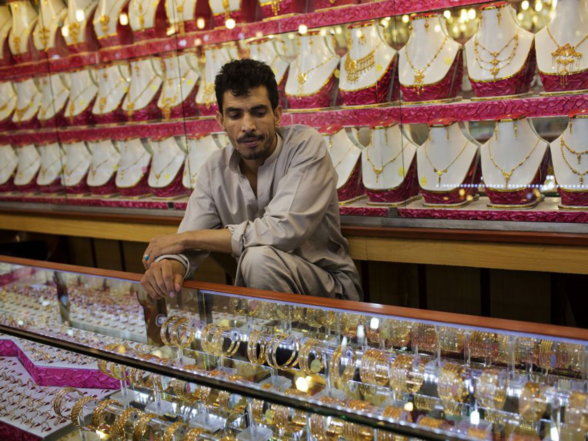 Business owners in Kabul are watching their profits drop as more people hold on to their cash