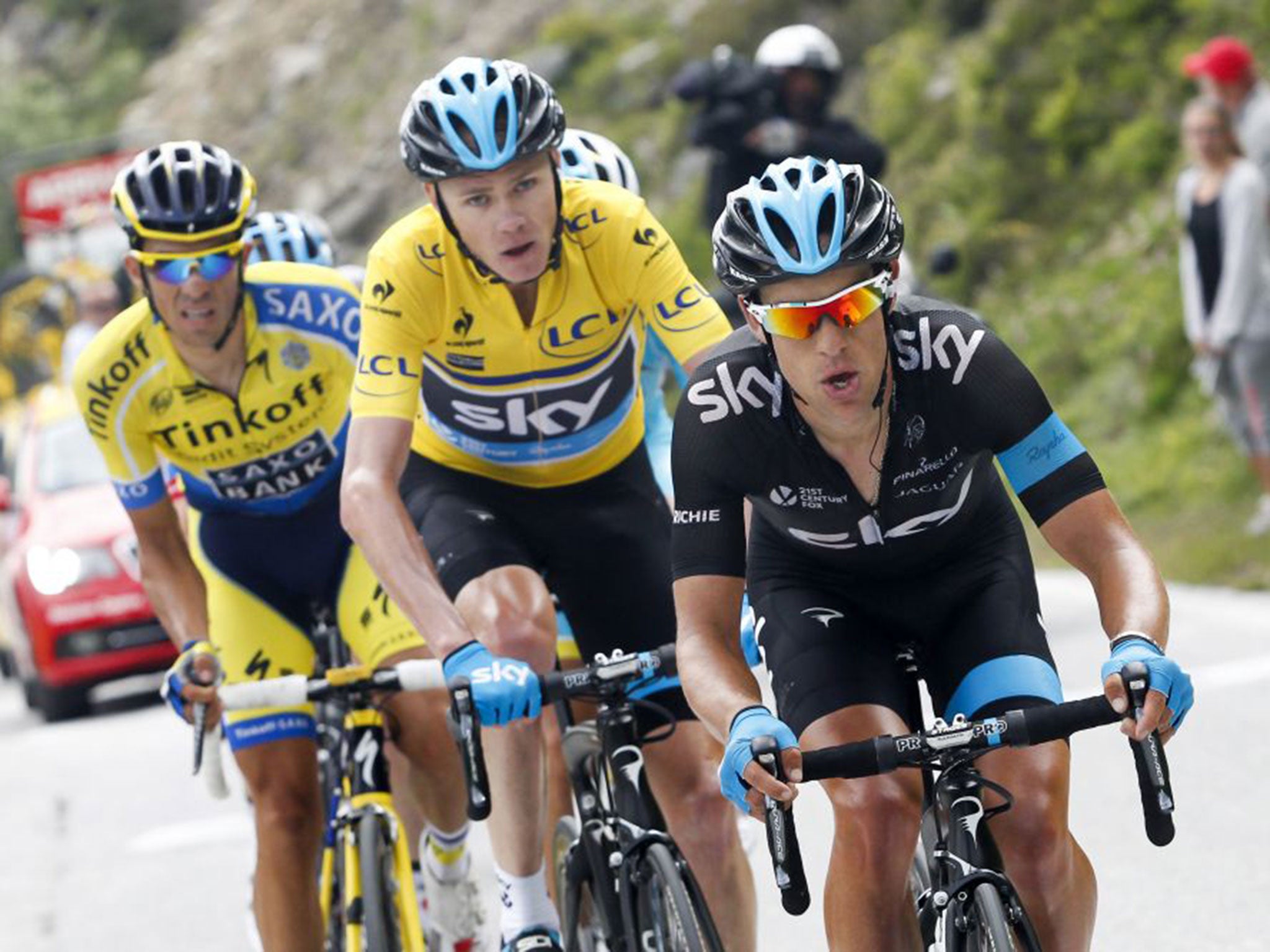 Mountain to climb: Richie Porte, right, is followed by Chris Froome and his rival Alberto Contador