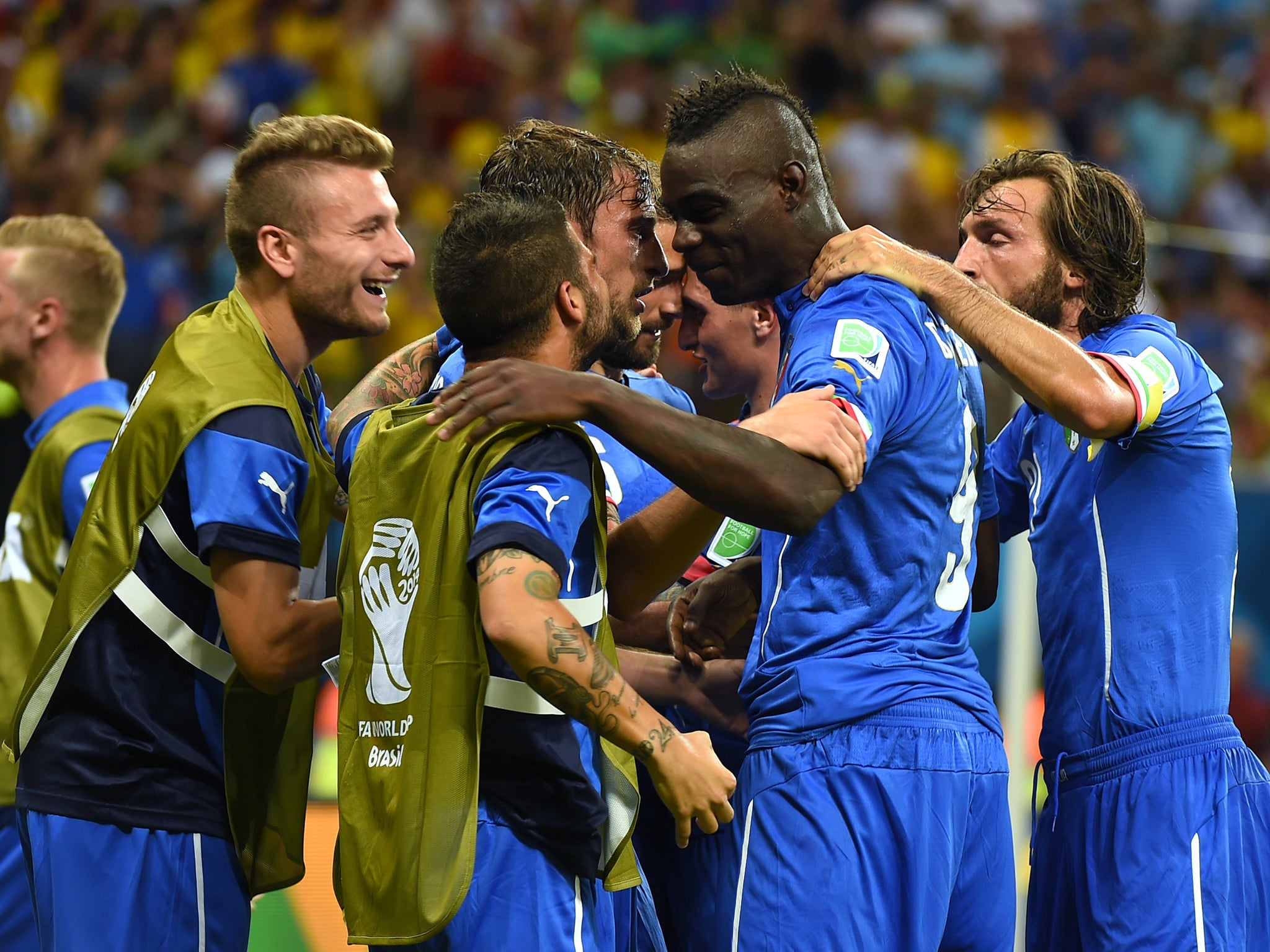 Italy celebrate their second goal