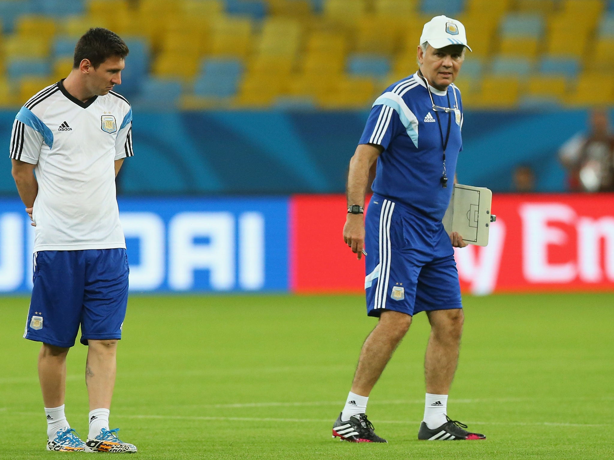 Coach Alejandro Sabella of Argentina and Lionel Messi
