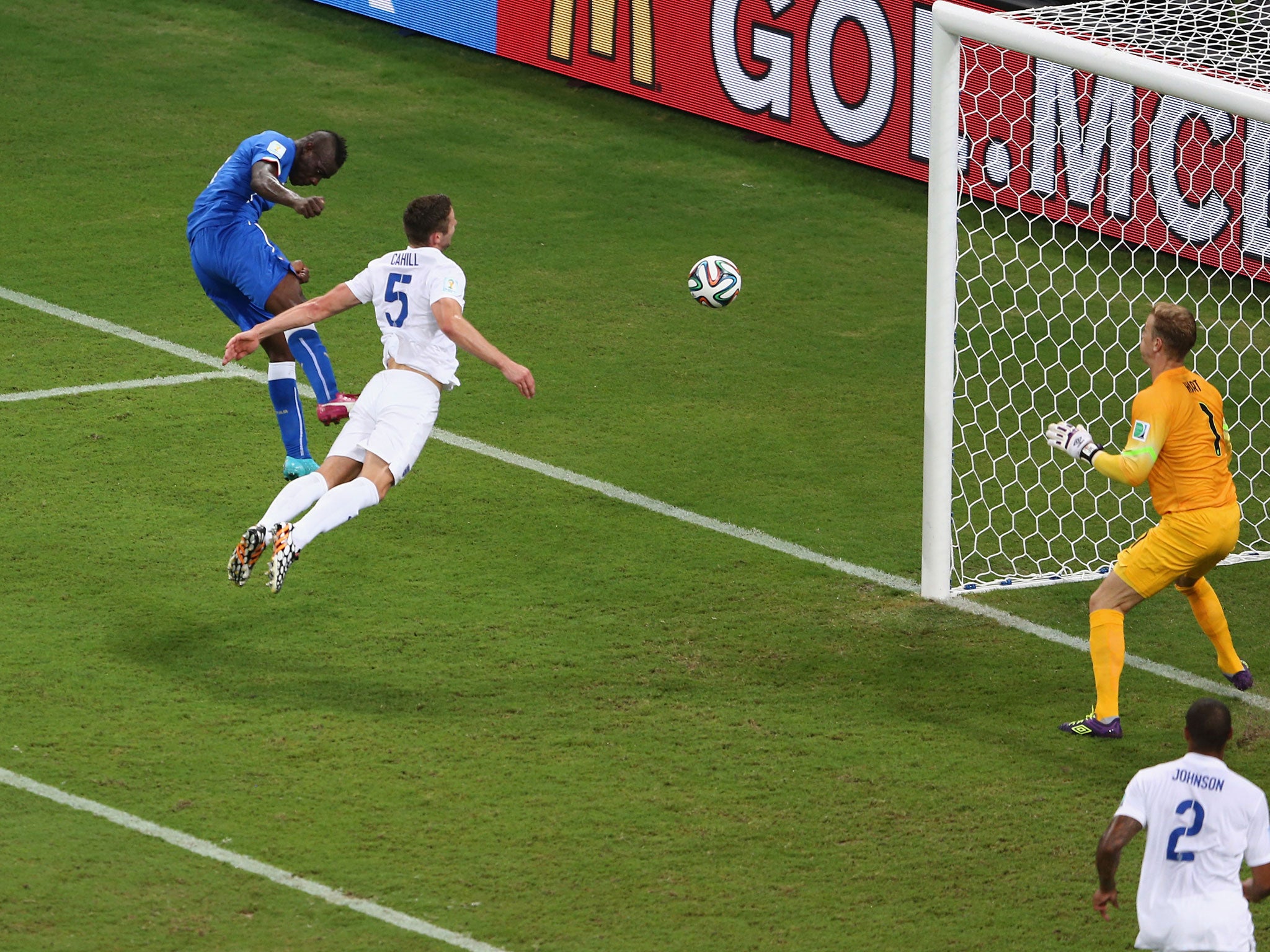 Mario Balotelli heads home Italy's second half winner against England