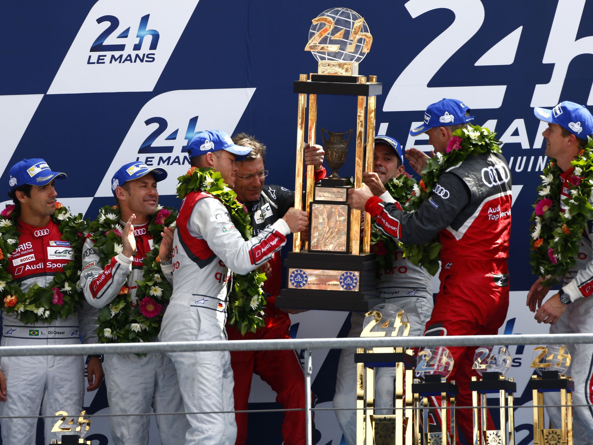 The Audi team celebrate after winning their 13th Le Mans 24 hour title