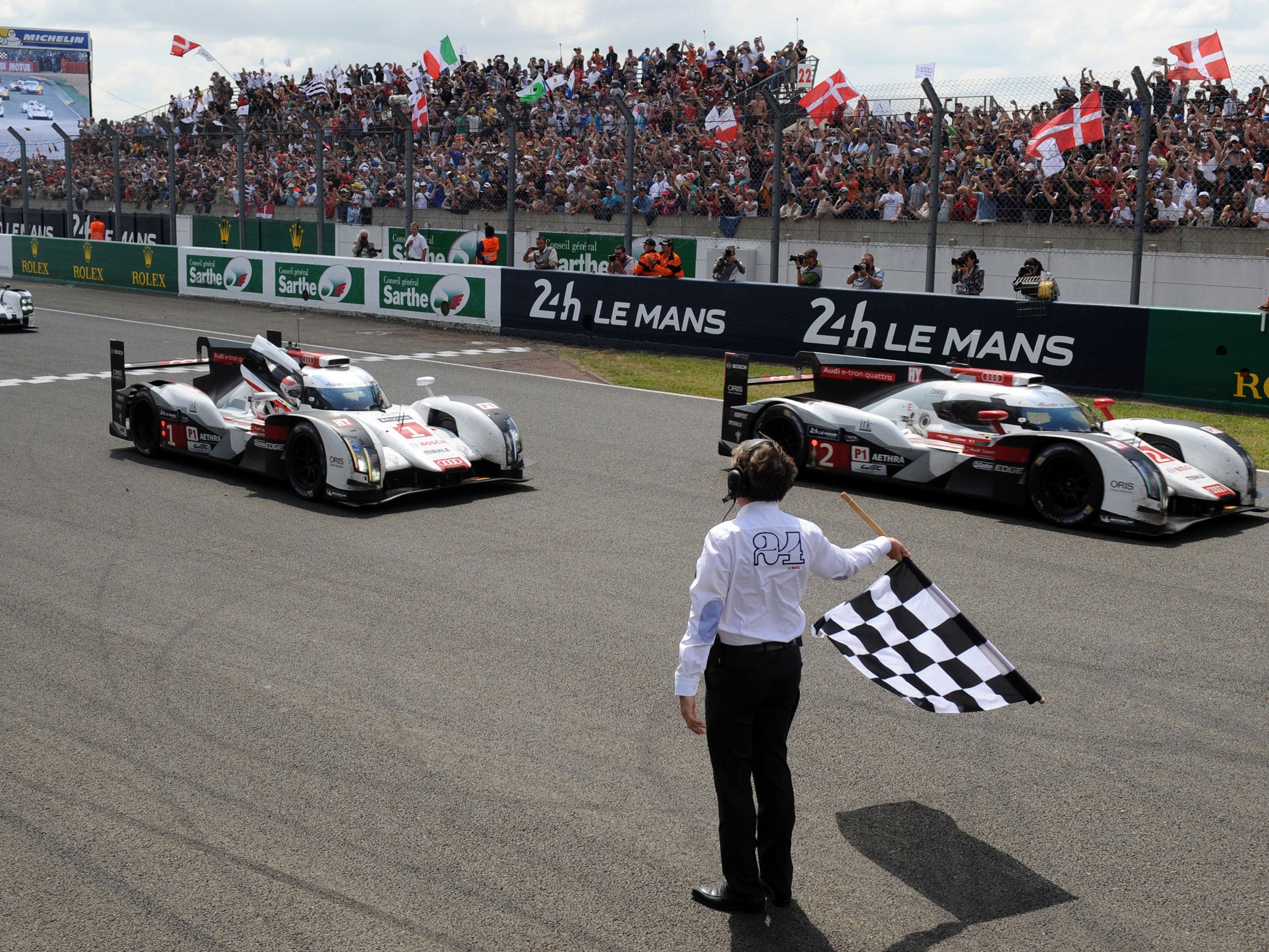 Audi take the chequered flag to win the Le Mans 24