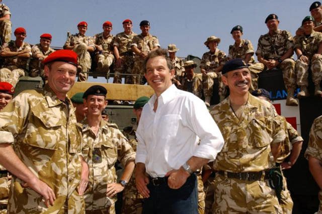 Tony Blair meeting troops in the port of Umm Qasr, Iraq in May, 2003 (PA)