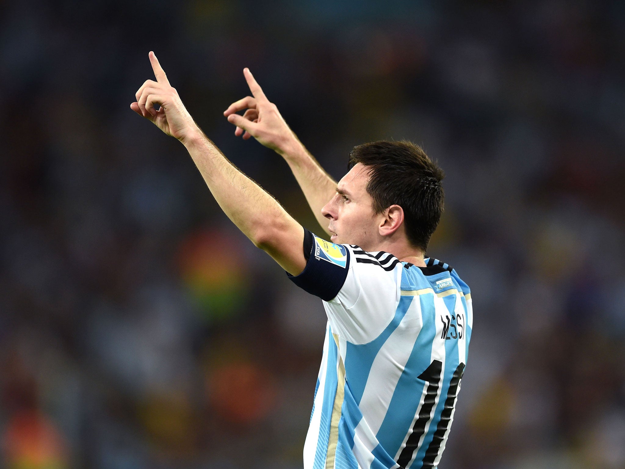 Lionel Messi celebrates scoring Argentina's second goal