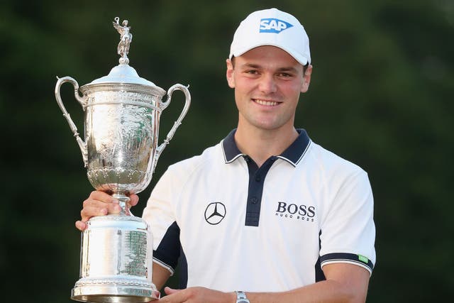 Martin Kaymer holds the trophy after his US Open triumph