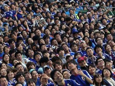 Japanese fans clean stadium after 2-1 loss