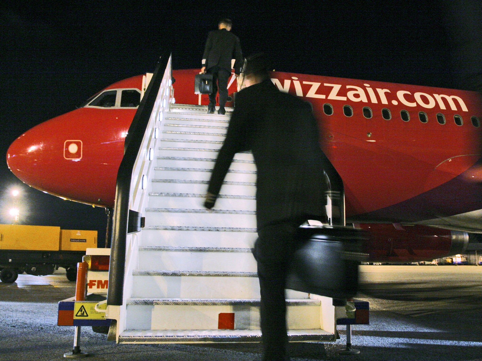 Air crew board the aircraft prior to one of their first very early take offs from Bulgarian capital Sofia, 22 September 2005