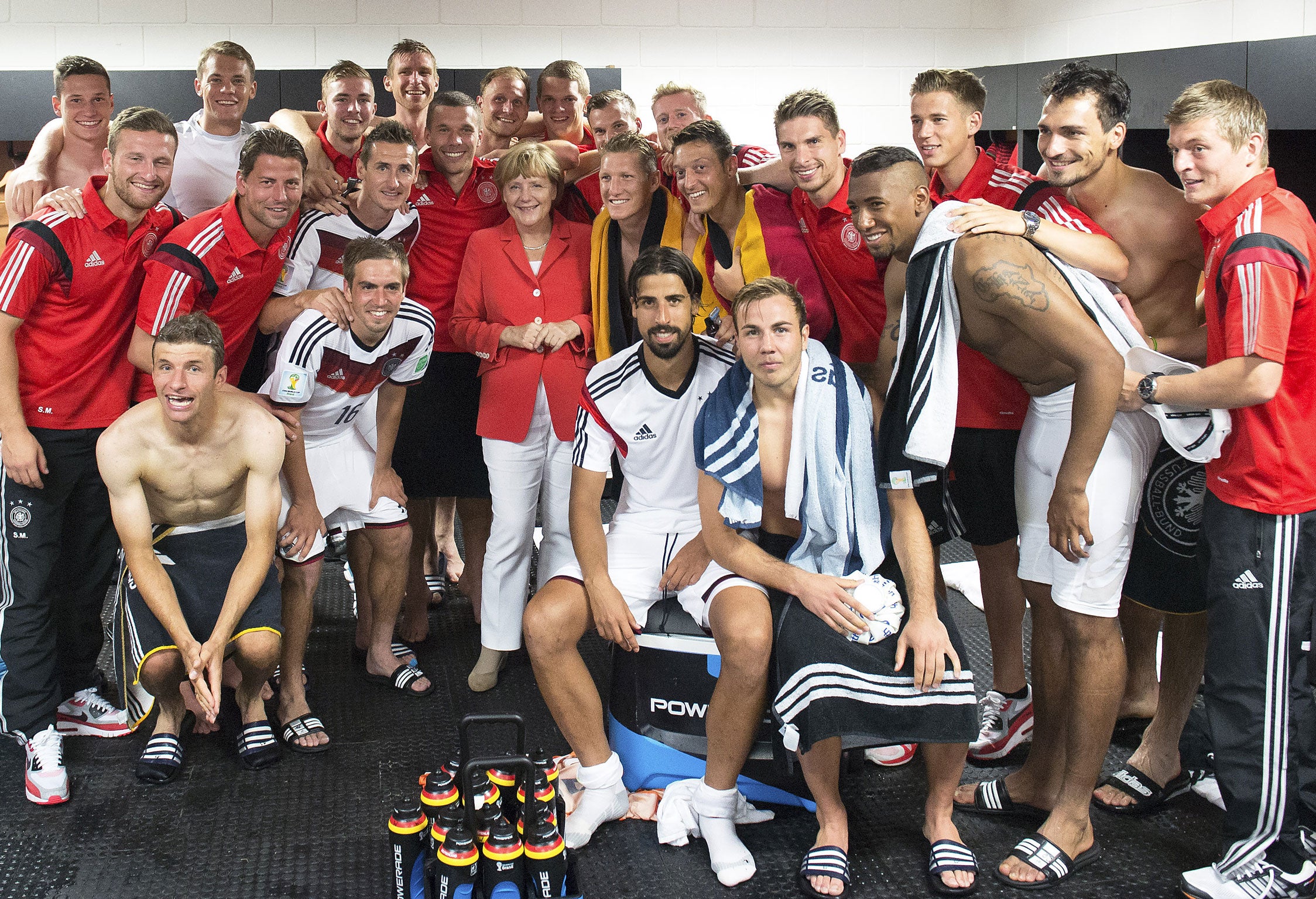German chancellor Angela Merkel posed with the national squad after the win against Portugal