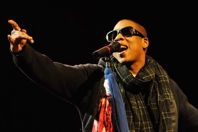 Rapper Jay Z performs on the Pyramid Stage at Glastonbury in 2008