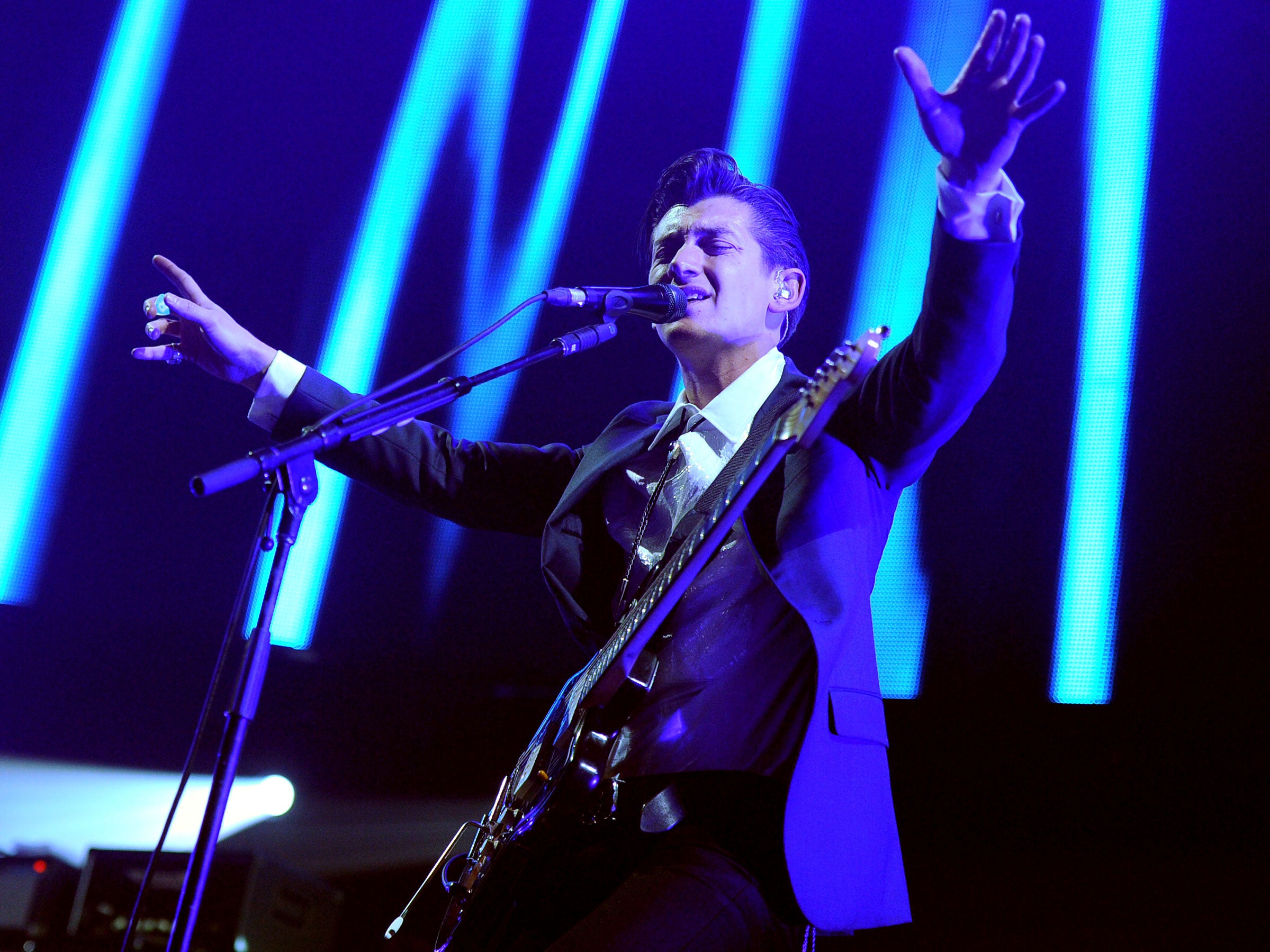 Musician Alex Turner of Arctic Monkeys performs onstage during The 24th Annual KROQ Almost Acoustic Christmas at The Shrine Auditorium on December 7, 2013 in Los Angeles, California.