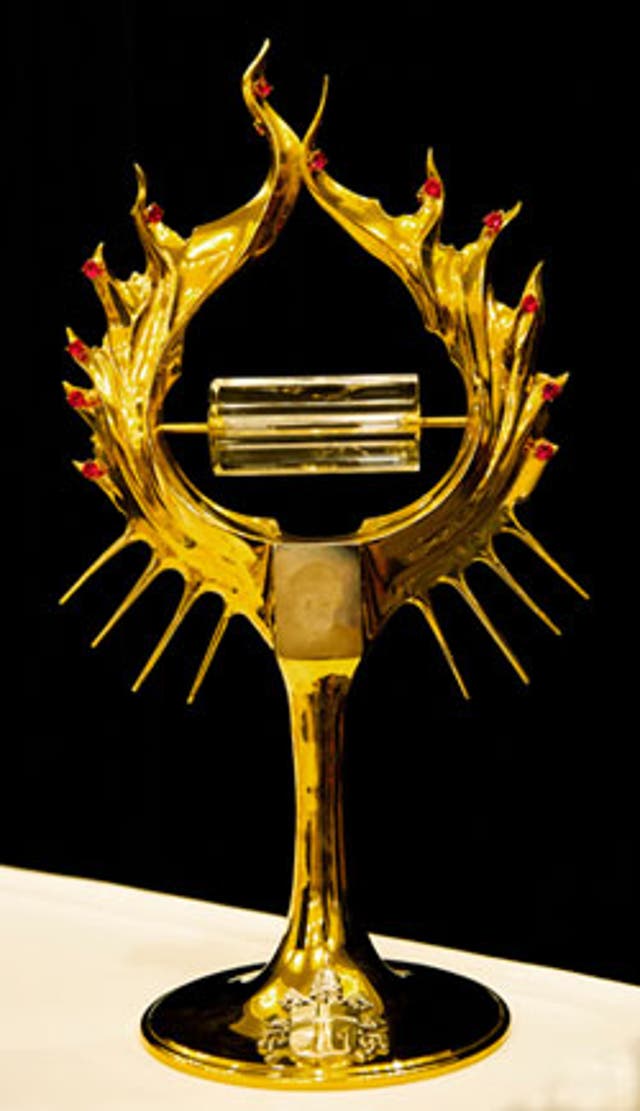At the centre of the reliquary is a glass ampoule that contains the blood of Saint John Paul II