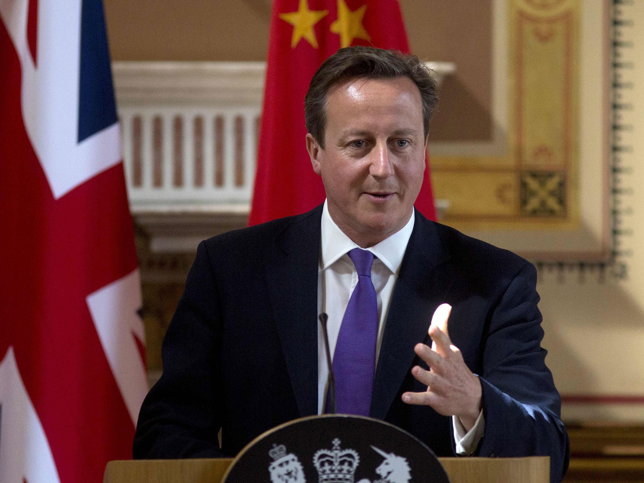 Prime Minister David Cameron speaks during a news conference in London 17 June, 2014
