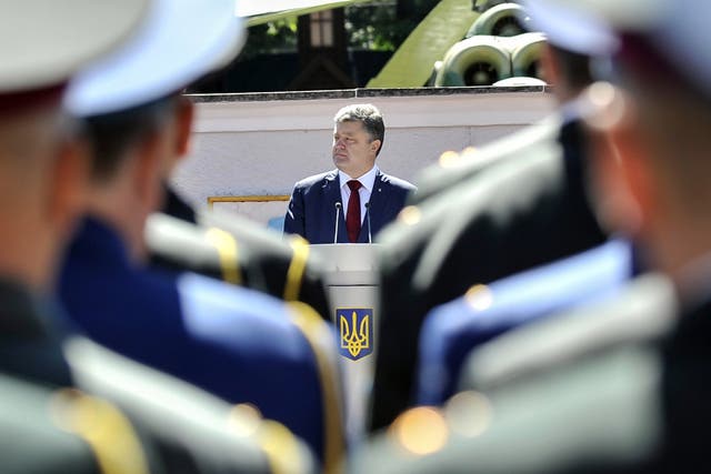 Ukrainian President Petro Poroshenko is trying to strike a peace deal