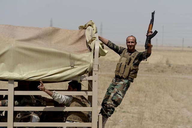 Kurdish Peshmerga forces took control of Kirkuk after it was abandoned by the Iraqi army 