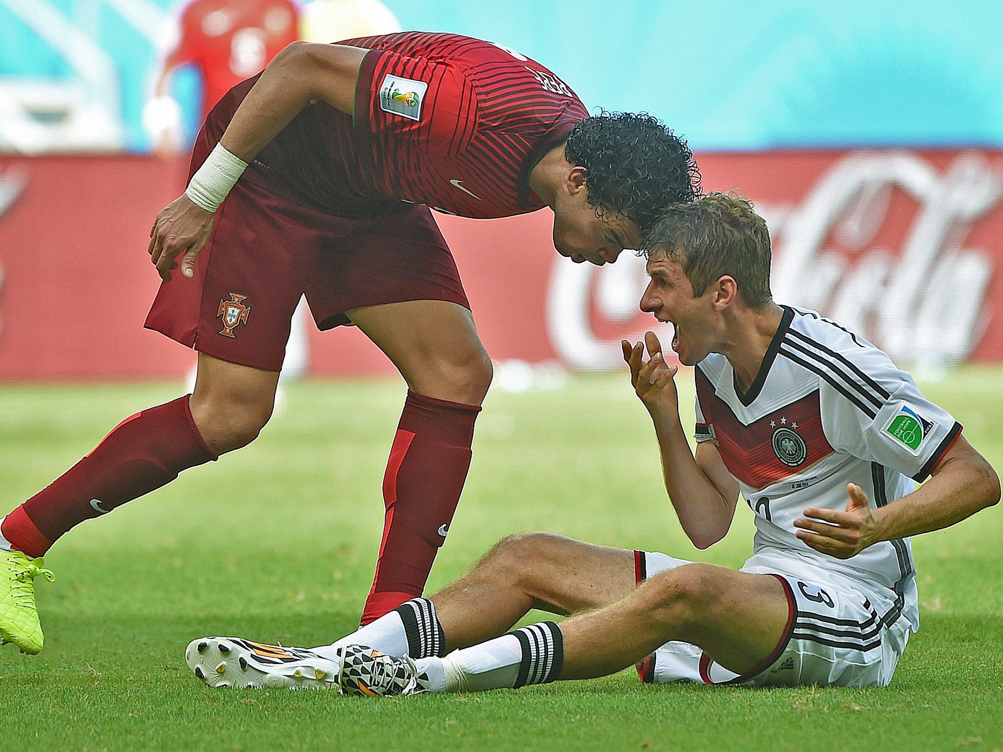 Call that a head-butt? Pepe sins by placing his head on Thomas Müller’s for which he is promptly sent off