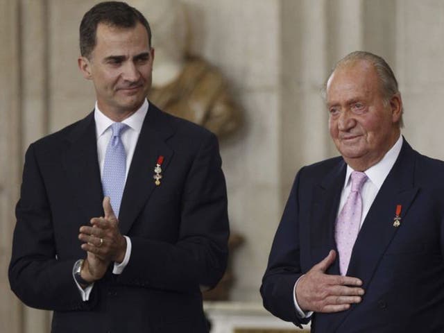 Prince Felipe and King Juan Carlos at the official abdication ceremony at the Royal Palace in Madrid