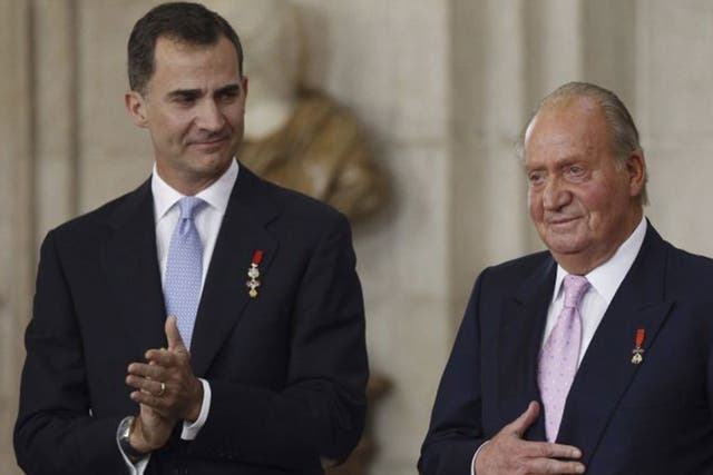 Prince Felipe and King Juan Carlos at the official abdication ceremony at the Royal Palace in Madrid
