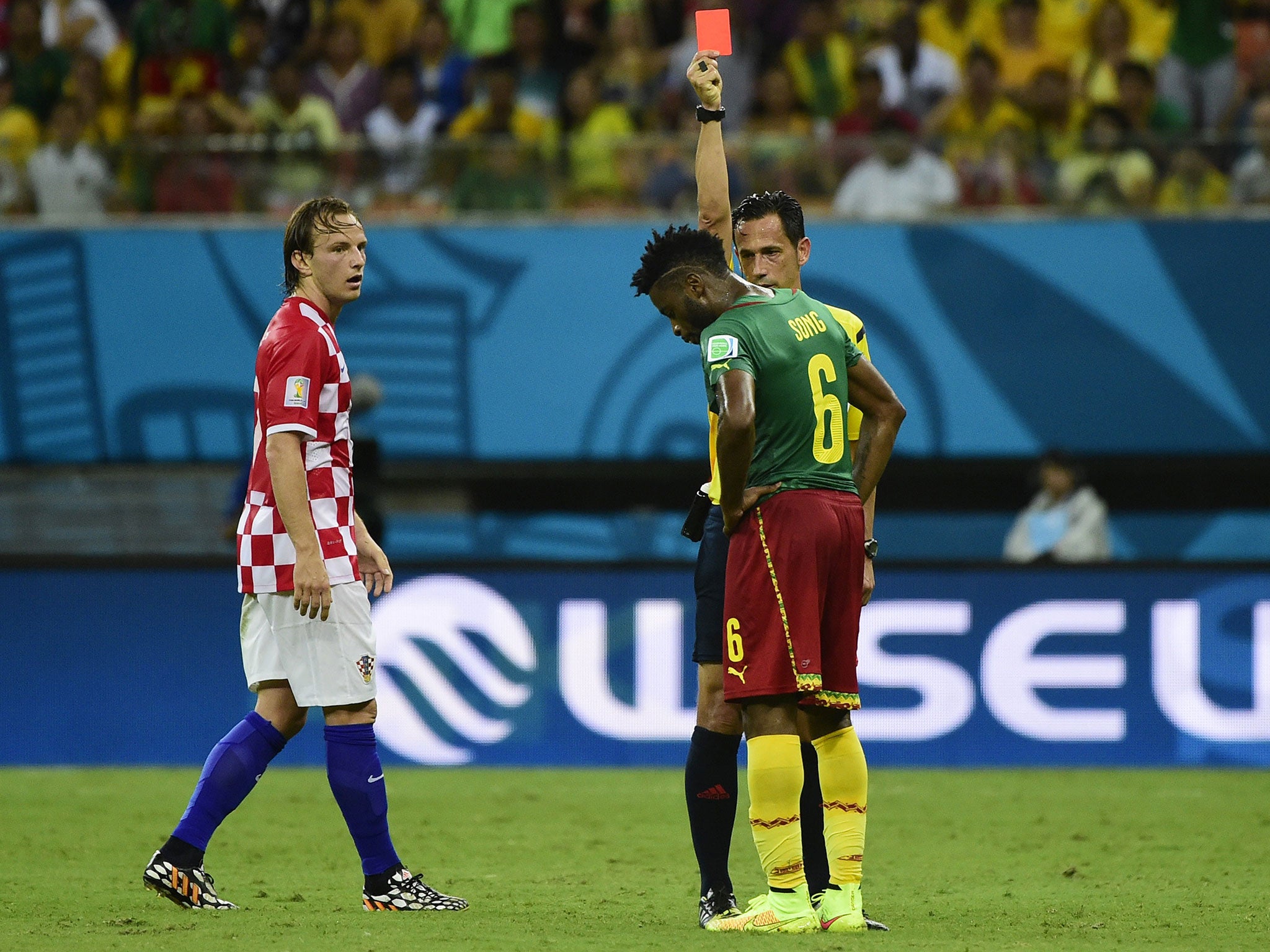 World Cup 2014: Alex Song given three-match ban for wild elbow against Croatia | The Independent | The Independent