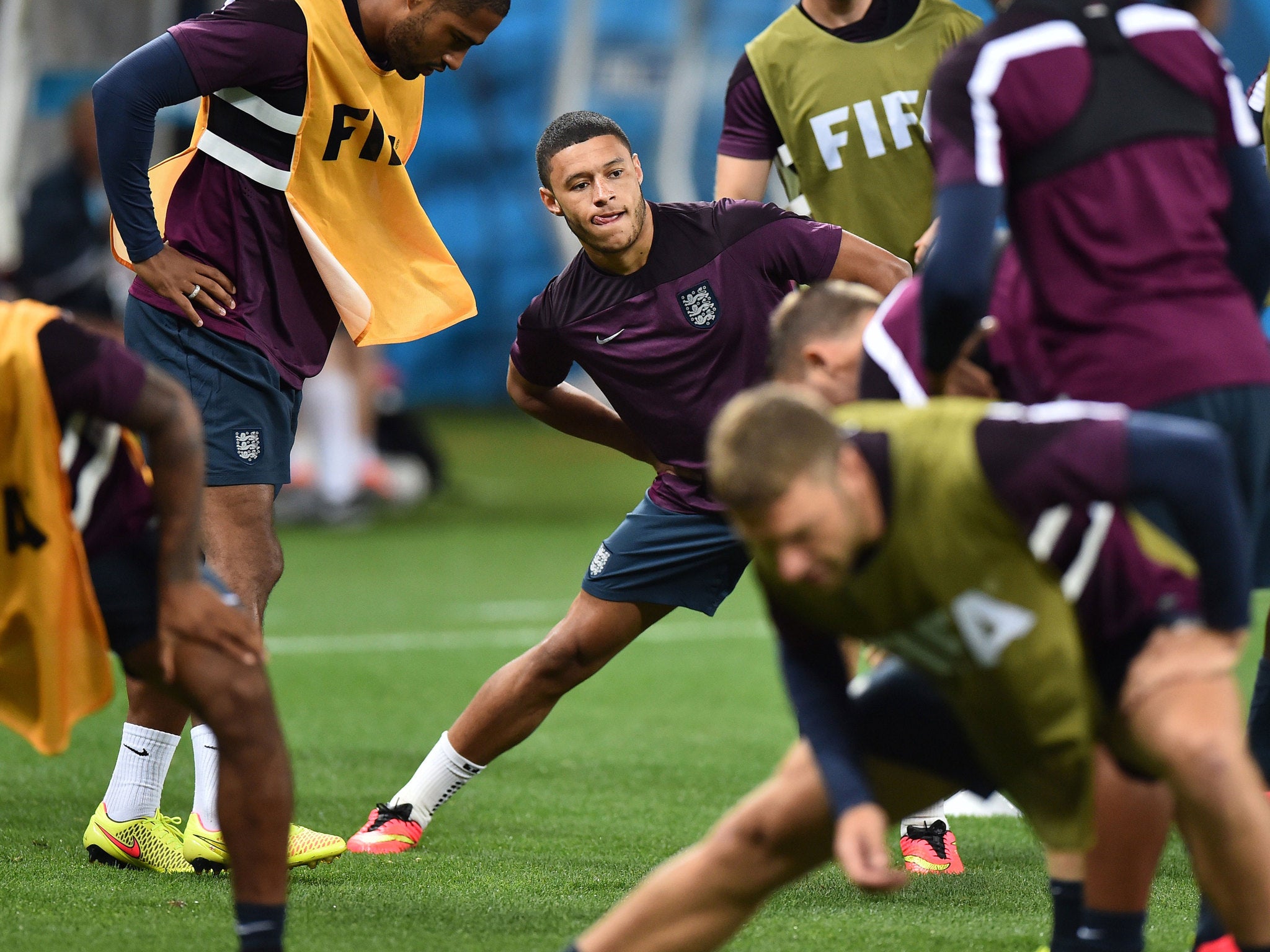 England's midfielder Alex Oxlade-Chamberlain attends a training session in the Corinthians Arena in Sao Paulo on the eve of the match between Uruguay and England.