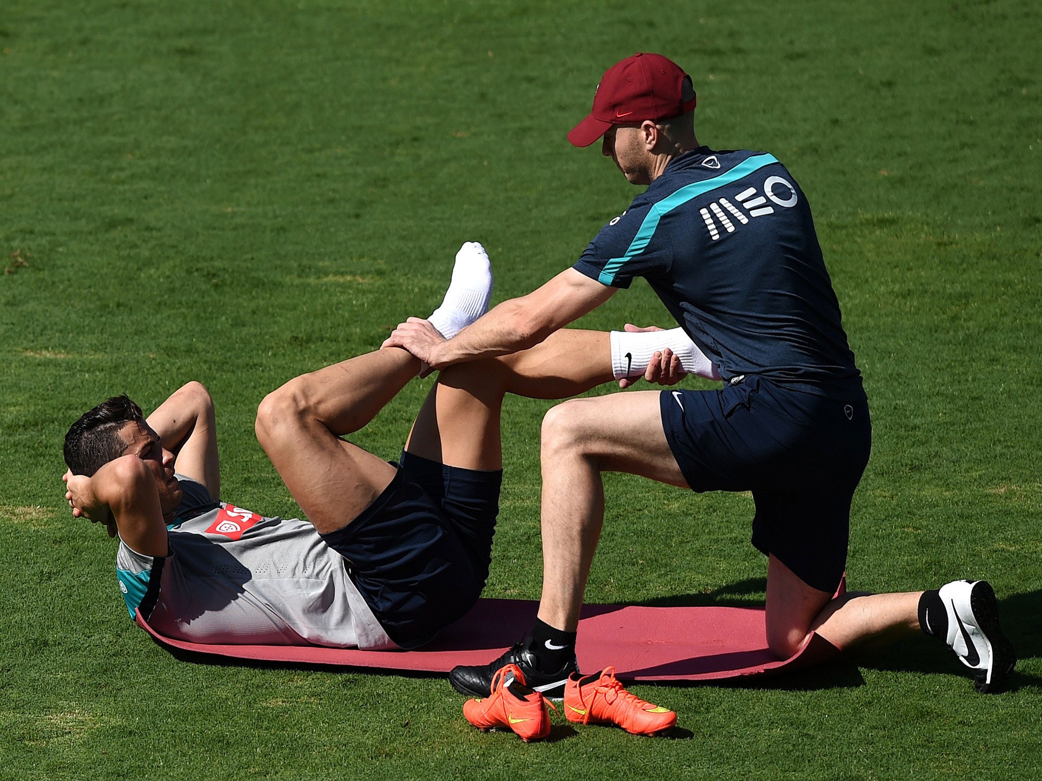 Cristiano Ronaldo receiving medical attention for his knee in training
