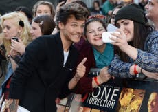 Louis Tomlinson is milking One Direction fans for their money