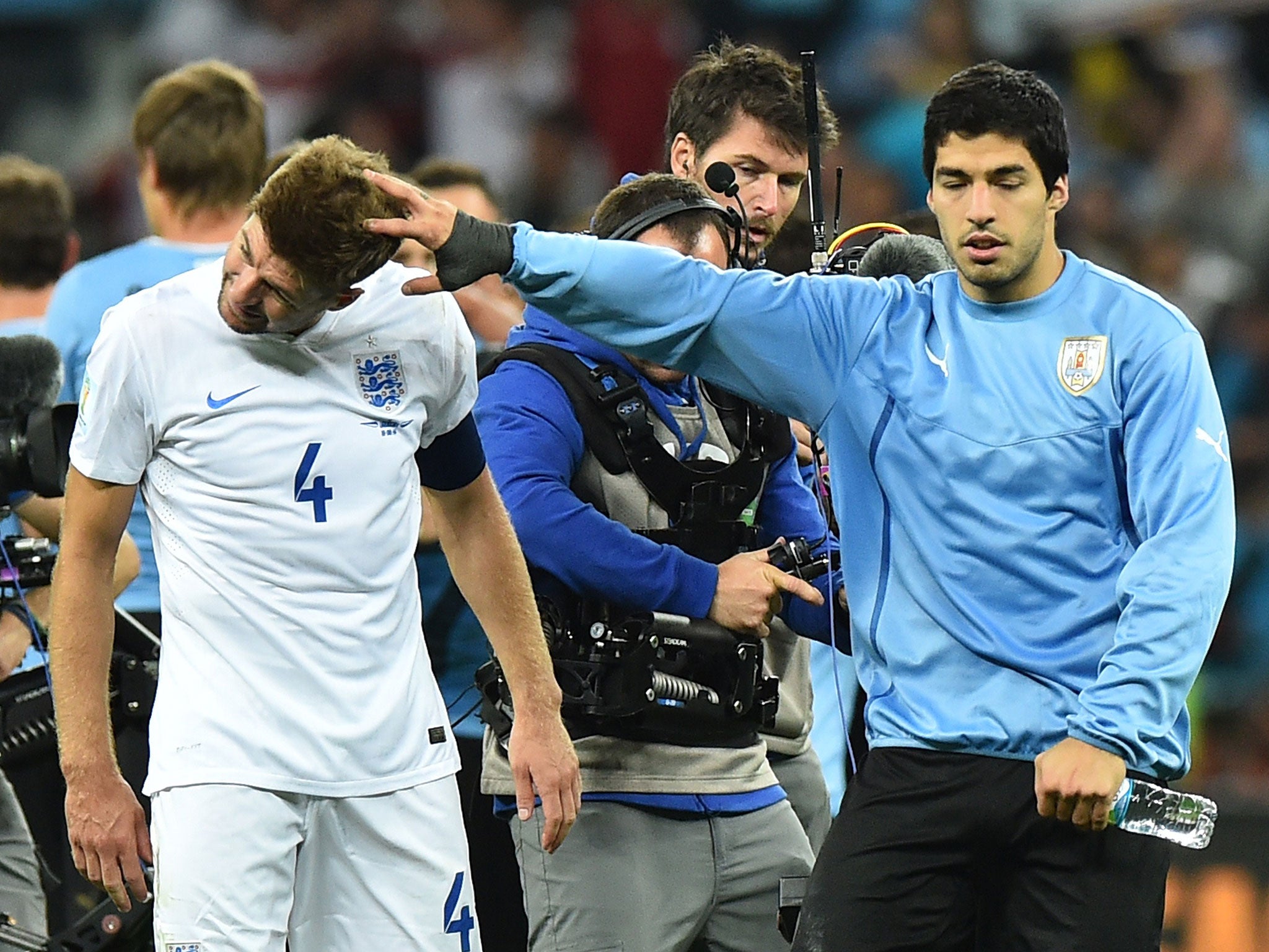 Gerrard's former team-mate Luis Suarez scored twice to eliminate England from the World Cup