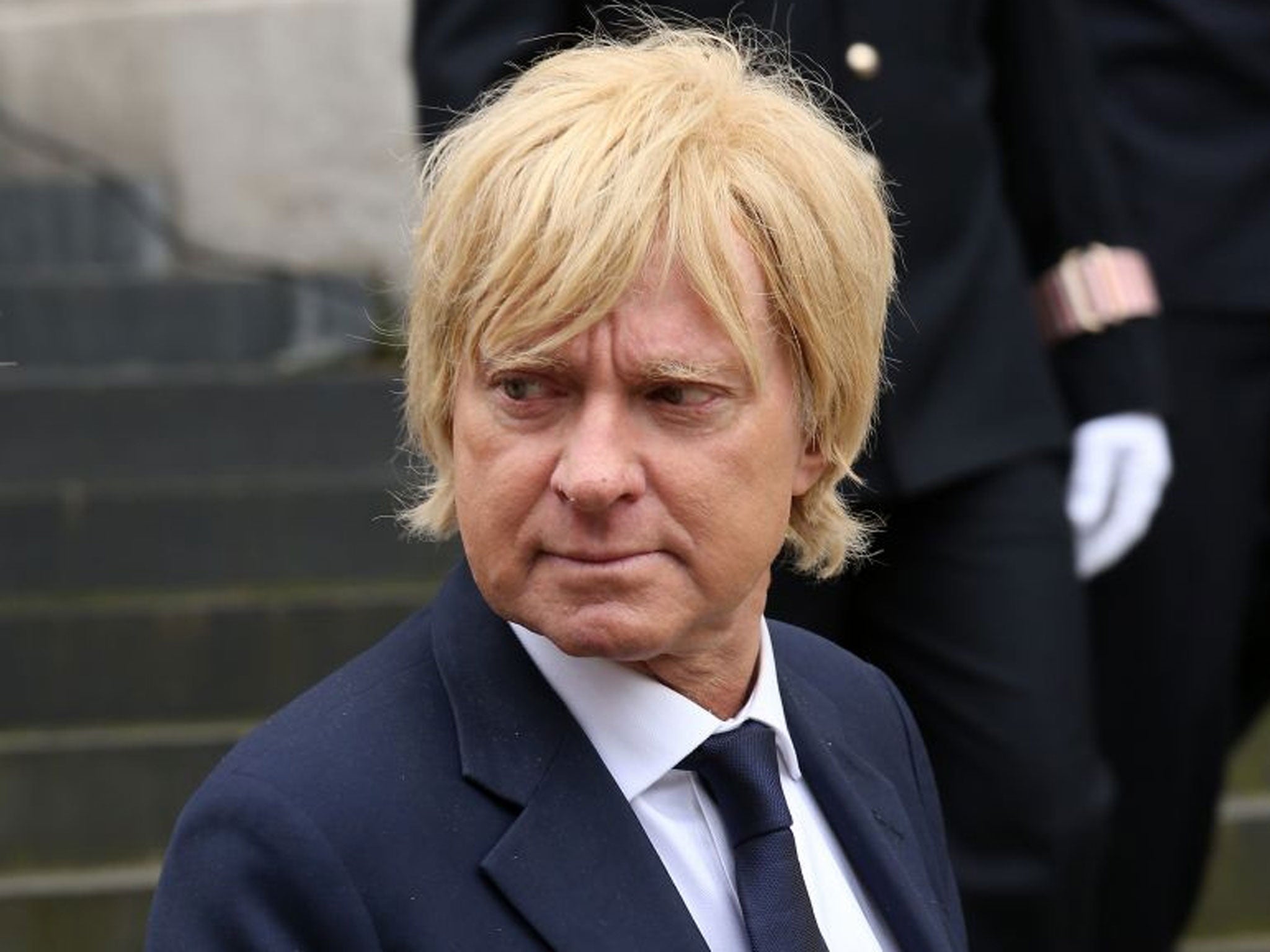 (FILE PHOTO) FILE - Conservative MP Michael Fabricant Apologies For 'Punch Journalist' Joke Tweeter Remark. LONDON, ENGLAND - APRIL 17: MP Michael Fabricant attends the Ceremonial funeral of former British Prime Minister Baroness Thatcher at St Paul's Ca