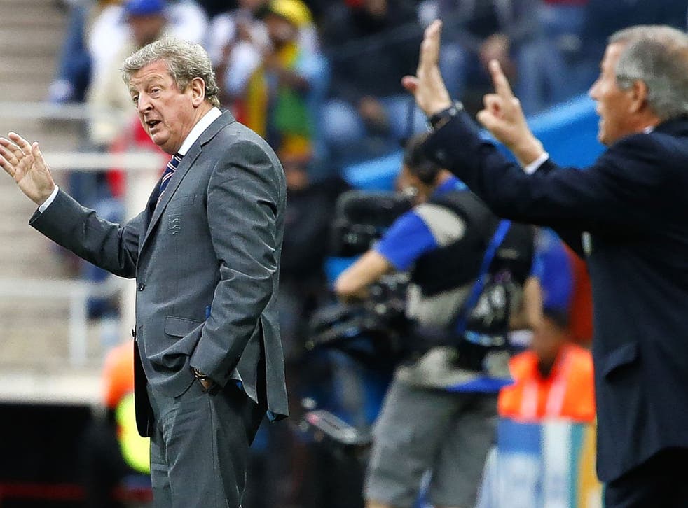 Roy Hodgson (left) on the touchline during England’s defeat by Uruguay
