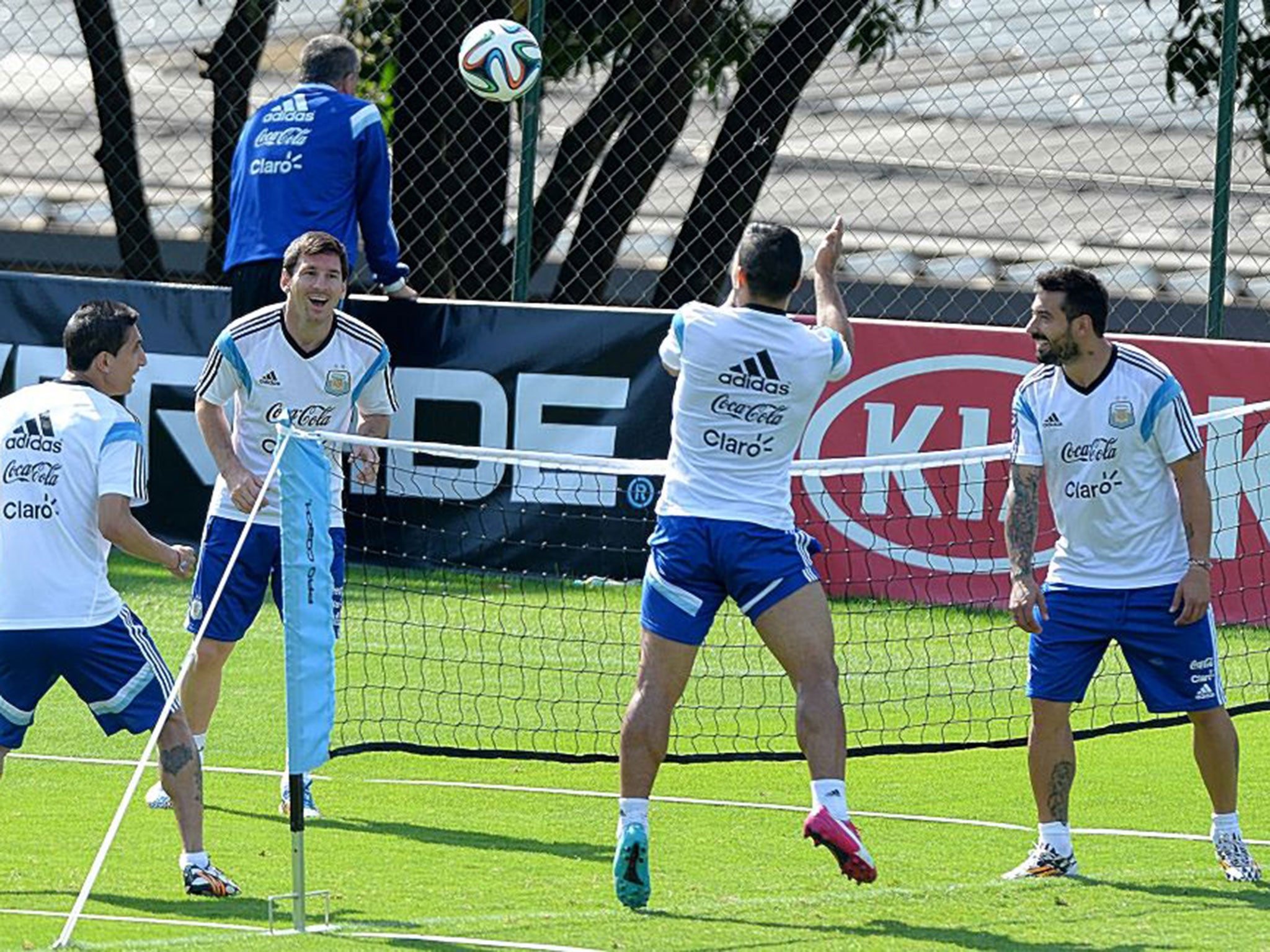Lionel Messi (second left) playing head tennis with Argentina team-mates yesterday
