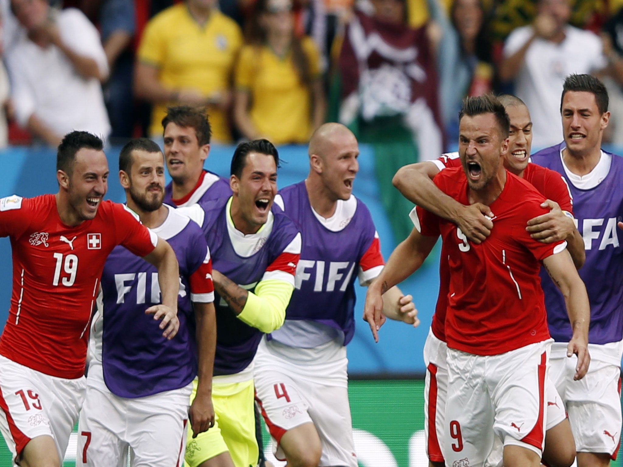 Haris Seferovic of Switzerland celebrates with his team-mates