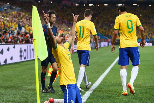 Neymar of Brazil celebrates scoring against Croatia