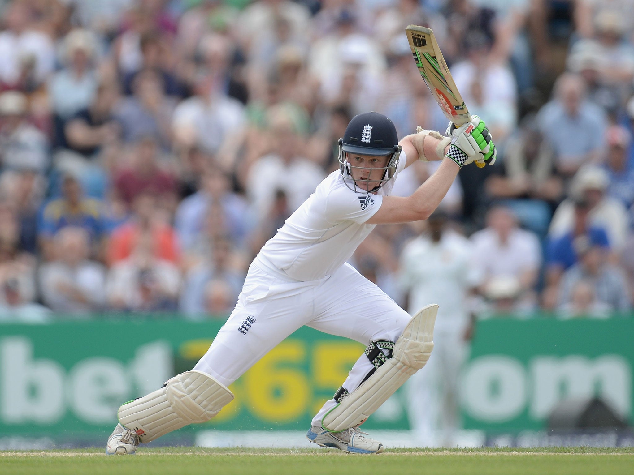 Sam Robson hits a four during the match between England and Sri Lanka