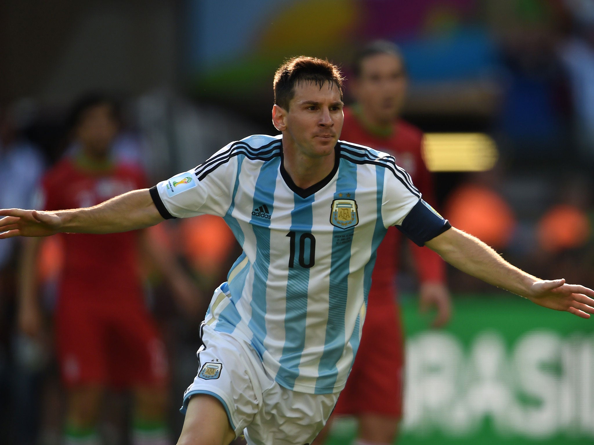 Lionel Messi celebrates his winning goal against Aregentina