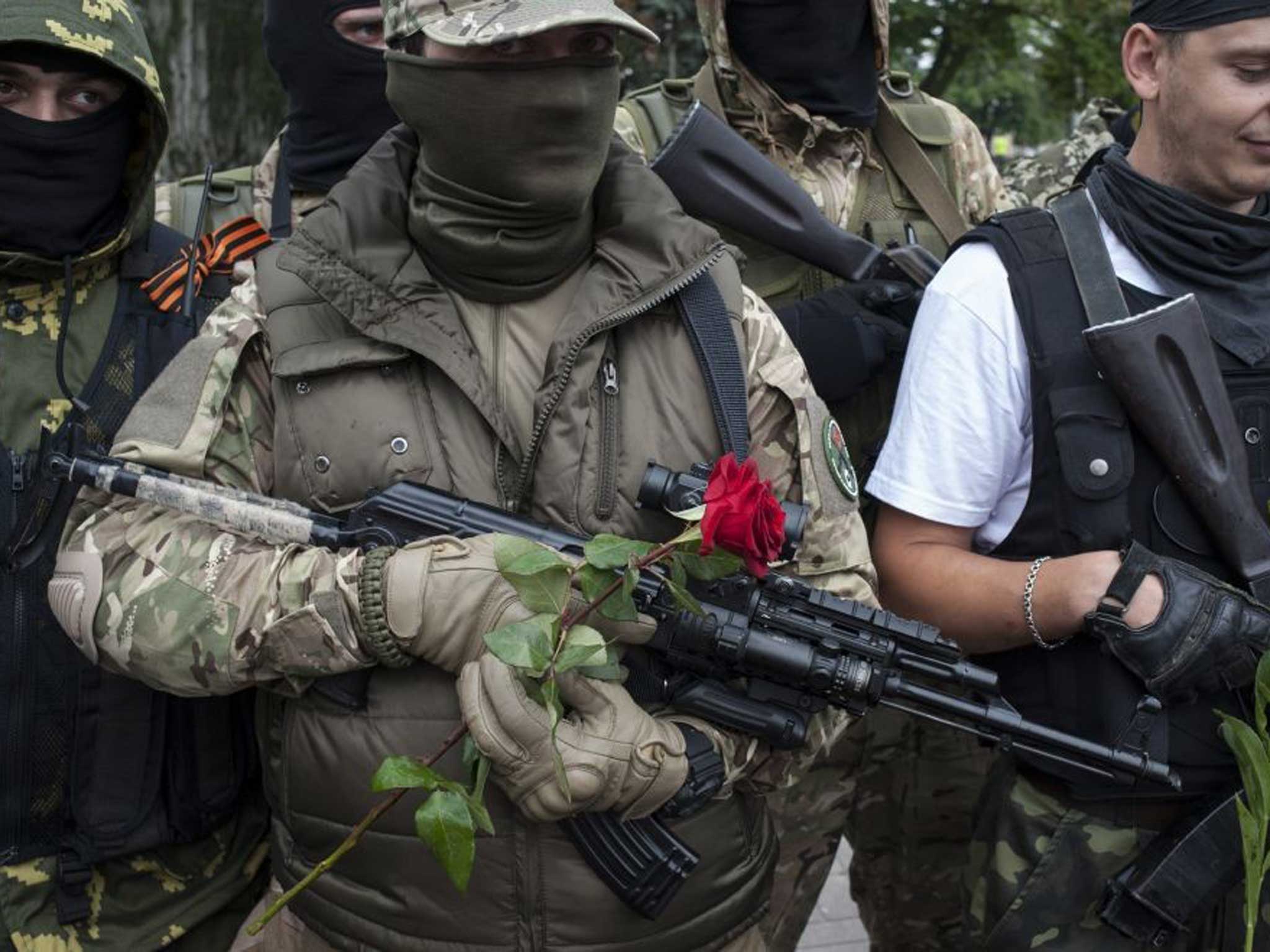 Pro-Russian fighters in Donetsk yesterday taking an oath of allegiance to the new ‘republic’
