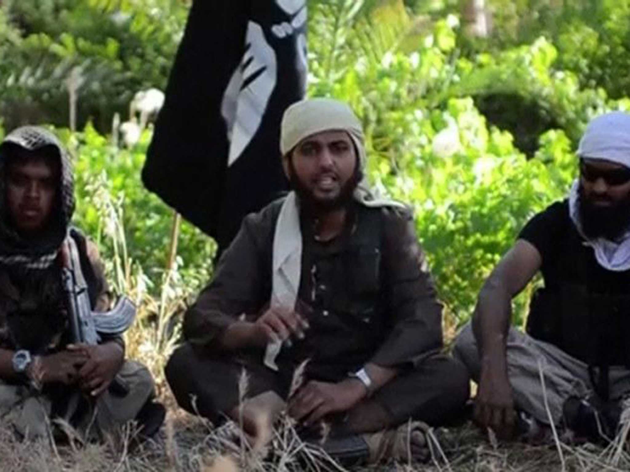 Call to arms: Nasser Muthana (centre), aged 20, from Cardiff, in the Isis recruitment video 