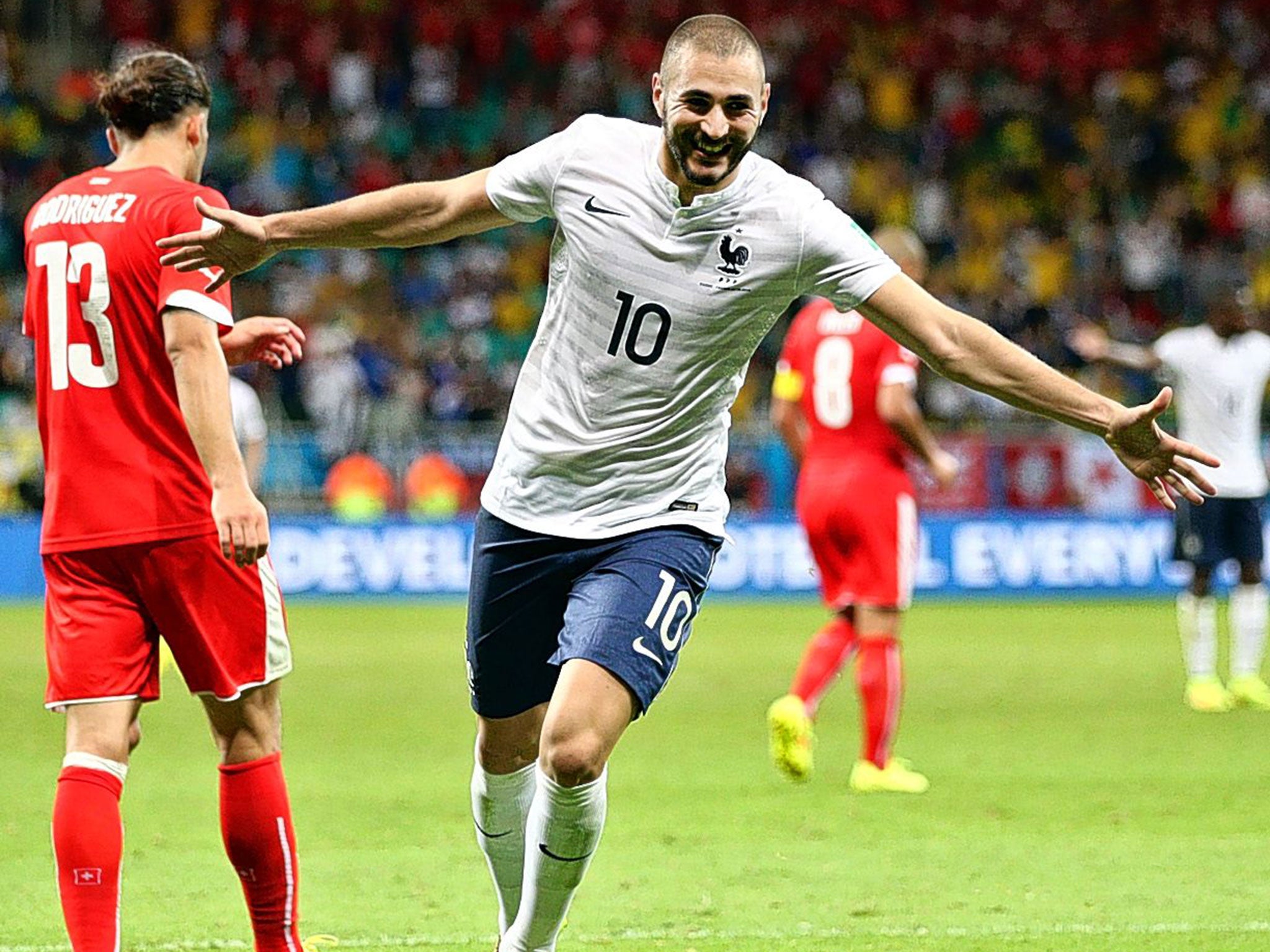 United front: Karim Benzema is enjoying playing with Olivier Giroud under France coach Didier Deschamps