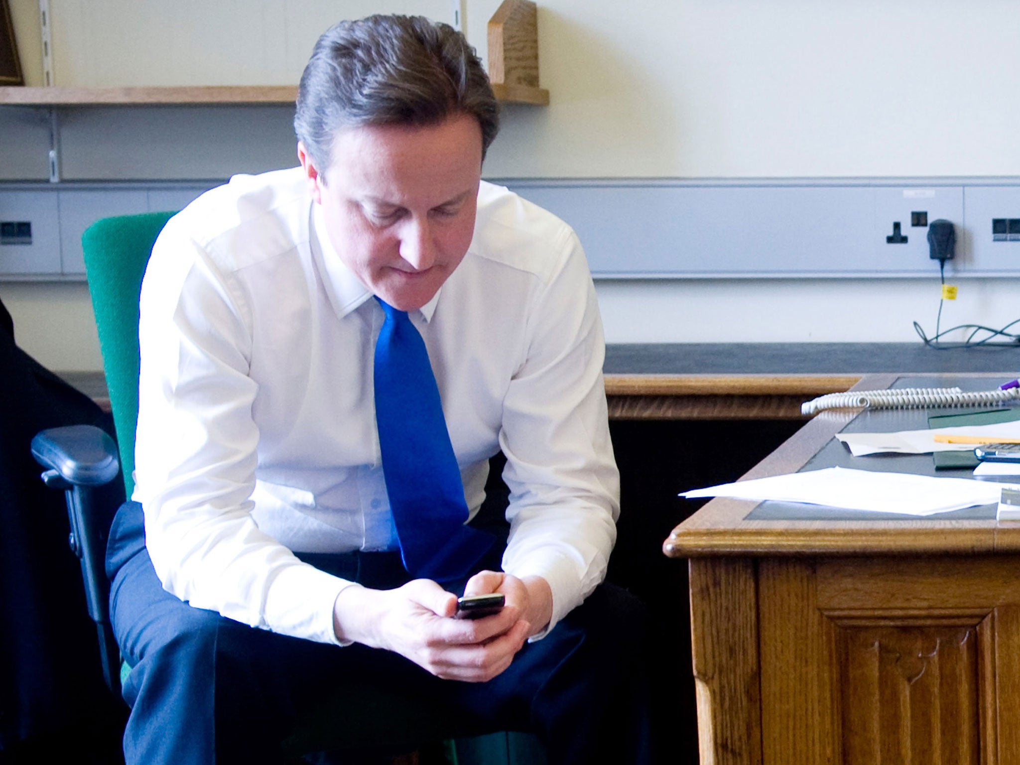 David Cameron has said he had to cut short holidays in Cornwall because of the lack of mobile phone signal