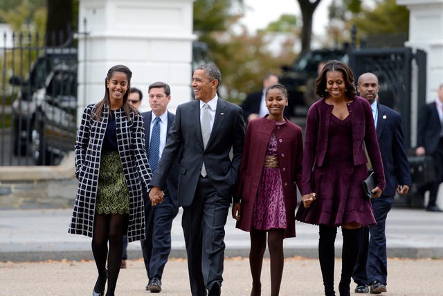 Barack and Michelle Obama with their daughters Malia and Sasha