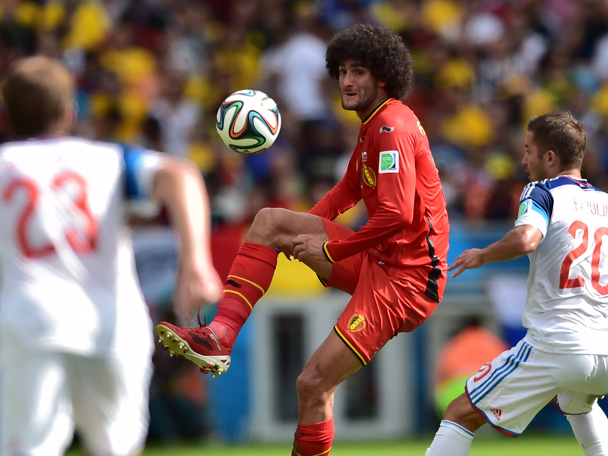 Fellaini in action for Belgium against Russia