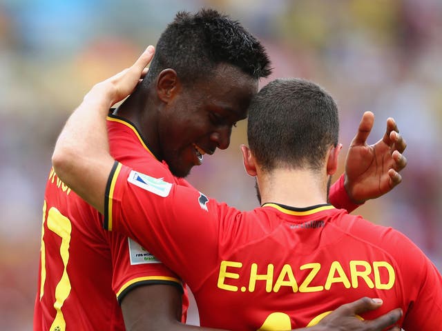 Divock Origi celebrates his late goal for Belgium against Russia with Eden Hazard