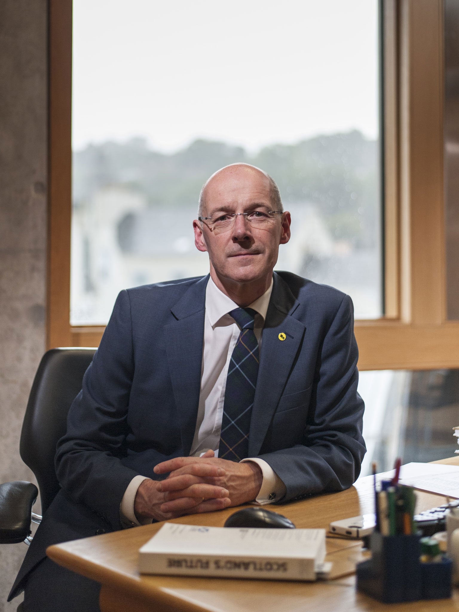 John Swinney, in his office at Holyrood, has pursued a free Scotland since he joined the SNP at 15