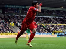 Suarez leaves Liverpool with a heavy heart