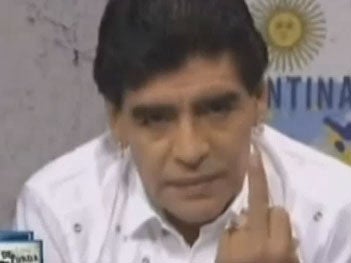 Former World Cup winner Diego Maradona gave the Argentina Football Association President a very visual response after he suggested the star was bad luck for the national team.