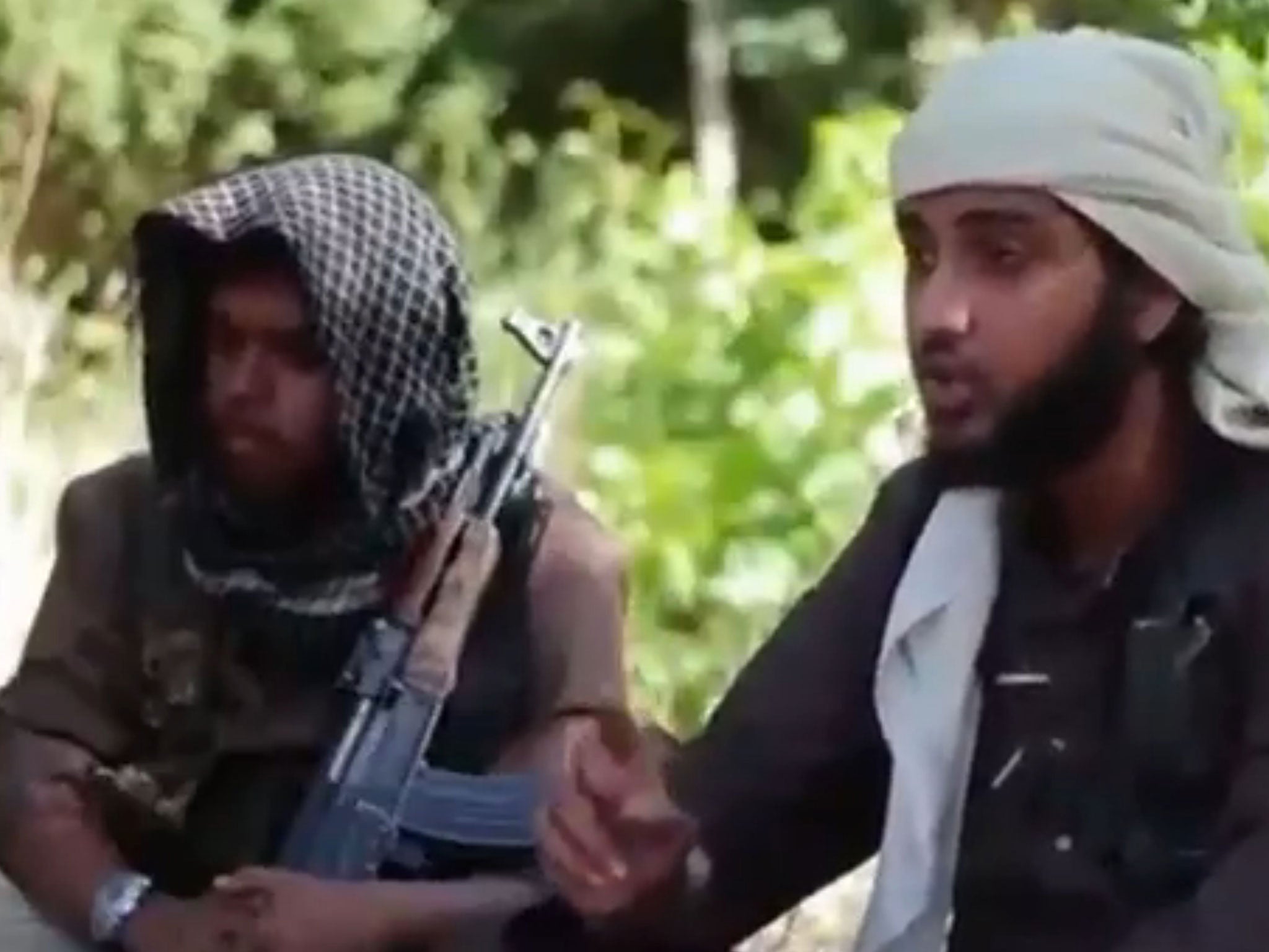 Screengrab taken from YouTube of a video showing Islamist fighters, who claim to be British, appearing in a recruitment video for the terrorist group Islamic State in Iraq and the Levant (Isis)