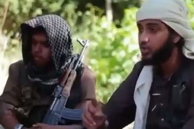 Screengrab taken from YouTube of a video showing Islamist fighters, who claim to be British, appearing in a recruitment video for the terrorist group Islamic State in Iraq and the Levant (Isis)