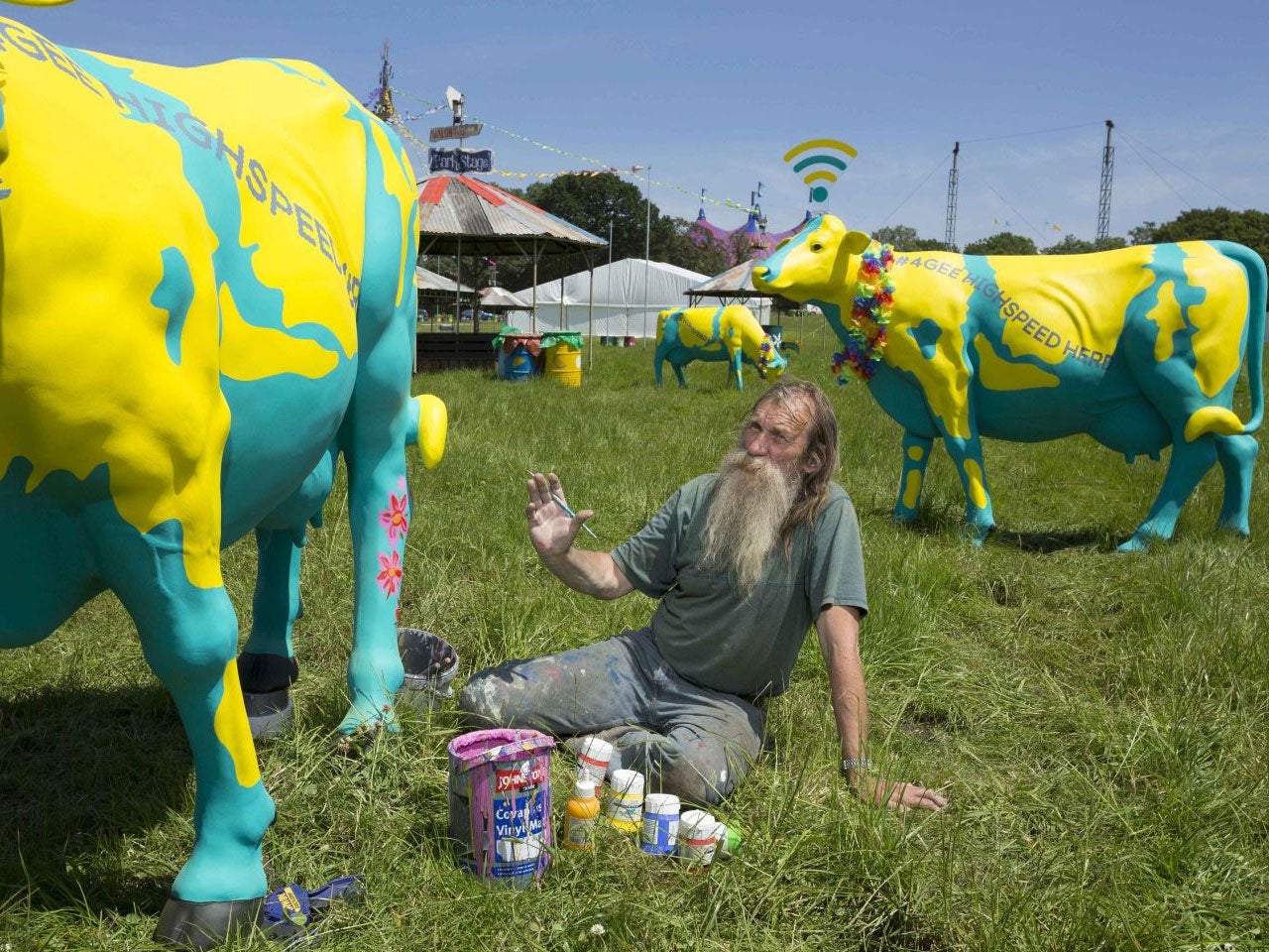 Life-size fibreglass cows decorated by artist Hank Kruger, modelled on Worthy Farm's famous dairy herd, which have been converted into 4G wifi hotspots to benefit festival goers at this year's Glastonbury.