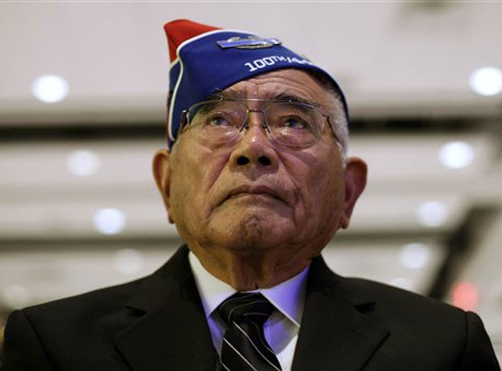 Don Miyada looks to the stage during a 2011 ceremony in honour of Japanese-American World War II veterans of the 100th Infantry Battalion, 442nd Regimental Combat Team in Washington