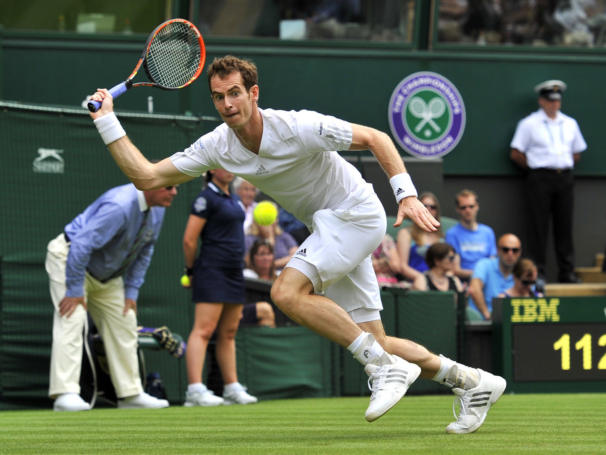 Andy Murray in action on the first day of Wimbledon
