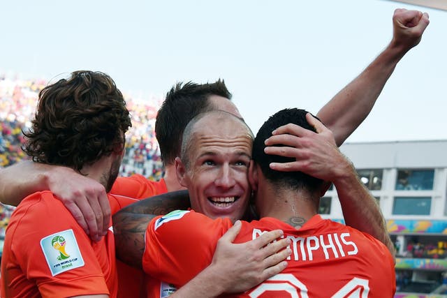 Netherlands celebrate their second goal against Chile